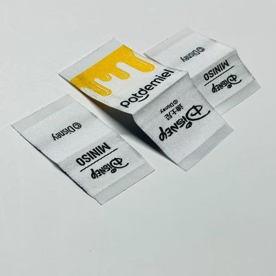 Etykiety odzieżowe na zamówienie Etykiety odzieżowe 0,4 mm Logo 5000 sztuk