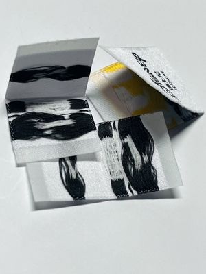 Etykiety odzieżowe na zamówienie Etykiety odzieżowe 0,4 mm Logo 5000 sztuk